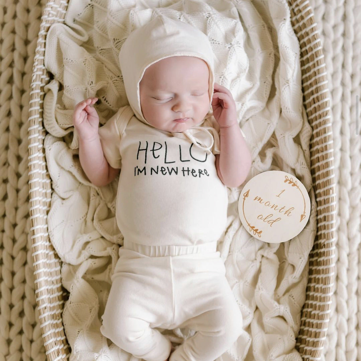 Hello I'm New Here Organic onesie